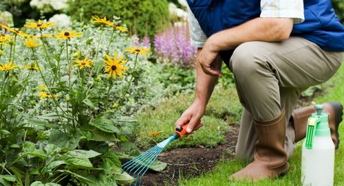Final safety check and insured gardeners working on a garden