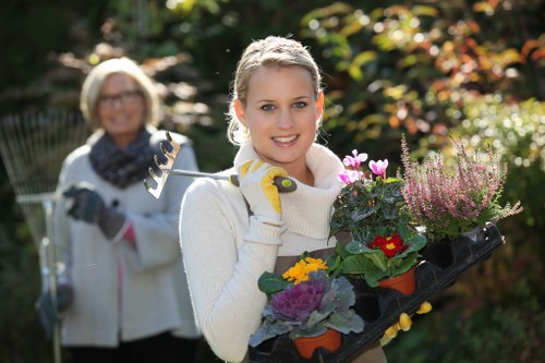 Professional gardeners working on a garden